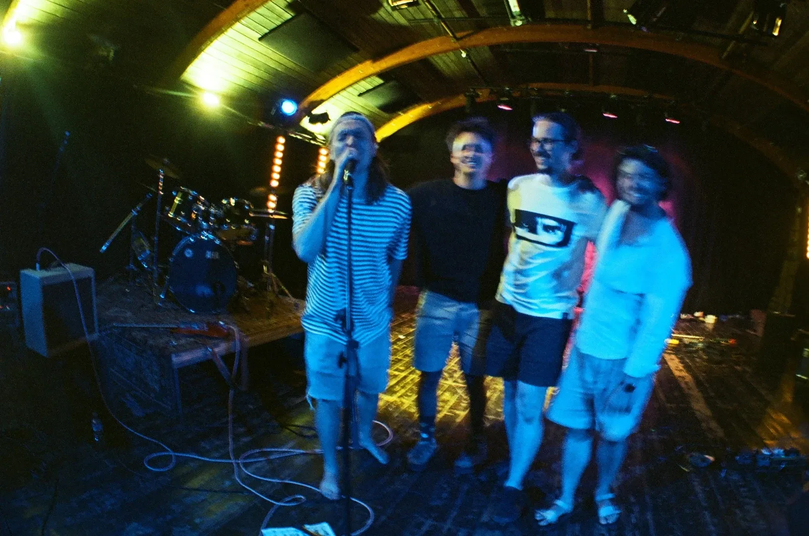 All four members of Chroustones squeezed around one microphone after the show